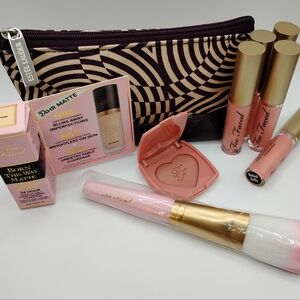 Too Face Bundle: Blush, Brush, 5 Lip Glosses, Foundation, & Cosmetic Pouch
